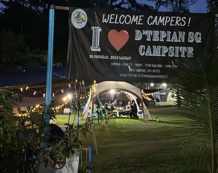Private riverside campsite